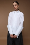Biała designerska koszula z architektonicznymi detalami